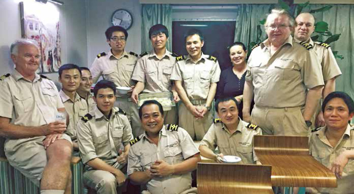Peter (left) believes building a good social and working relationship with his officers and crew is the basis for a happy, wellrun ship.