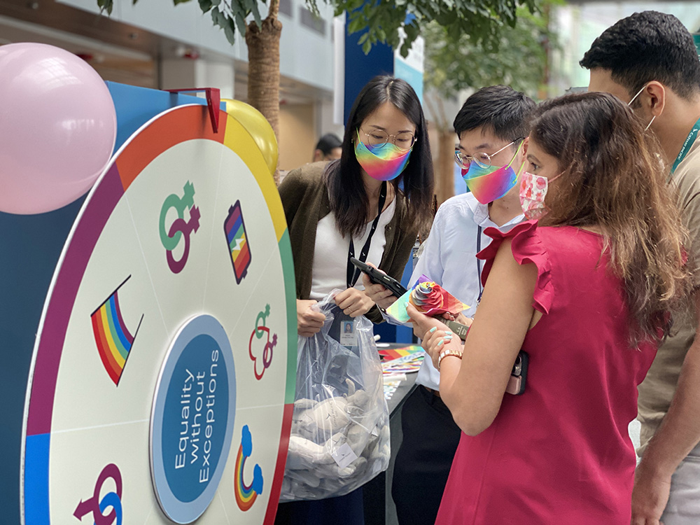 FlyWithPride, Cathay Pacific&rsquo;s LGBT+ network, transformed Cathay City into a carnival-like setting, with decorations, rainbow snacks, a photobooth, and a Pride-themed trivia wheel.