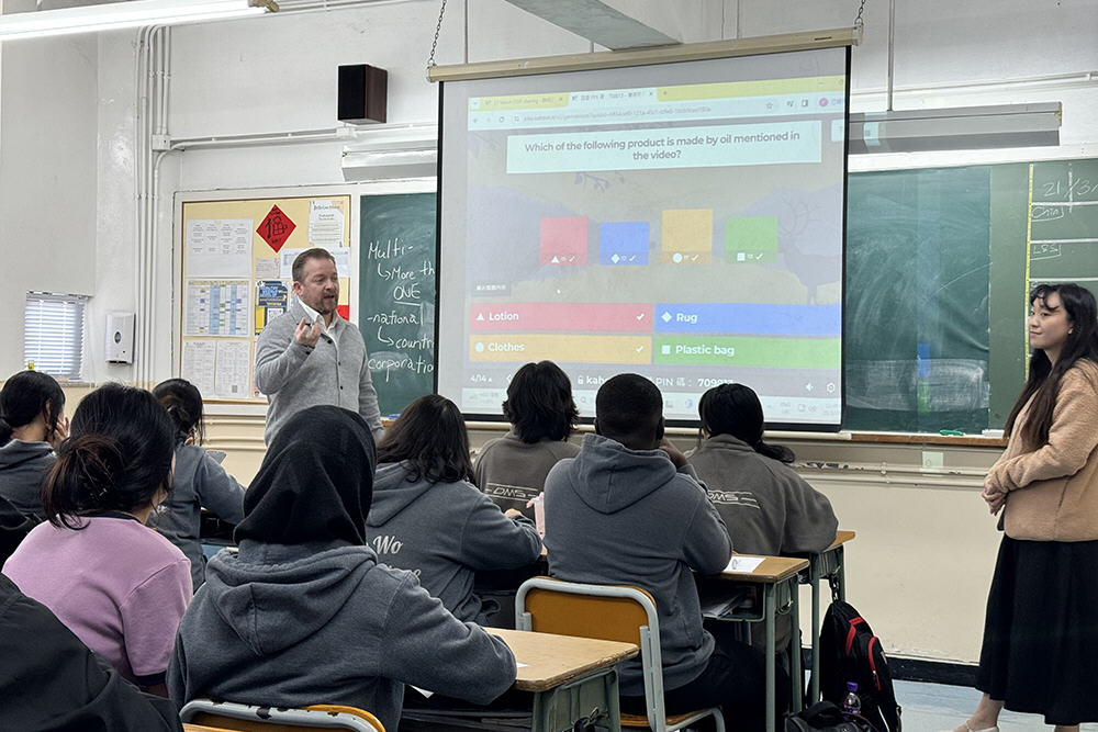 Mark in a group photo with his &ldquo;one-day&rdquo; students.