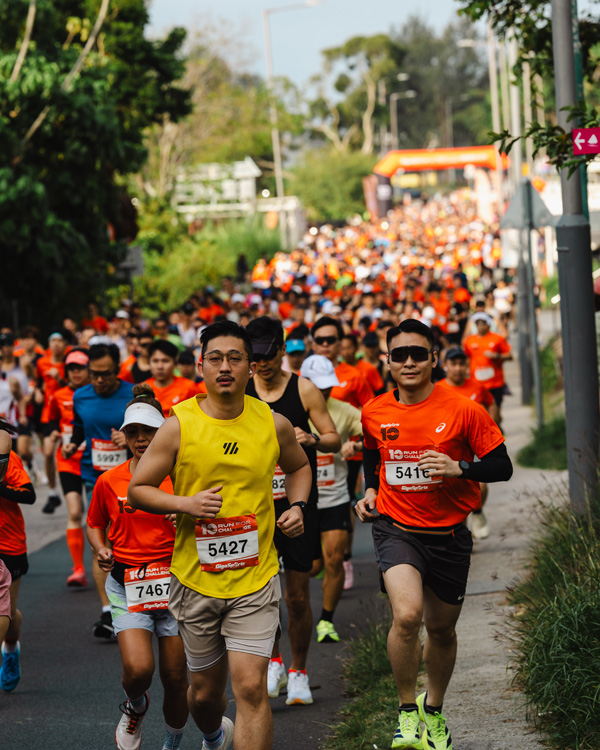 Charging ahead: runners flood the scenic Tai Mei Tuk course at the GigaSports 10th Anniversary Challenge