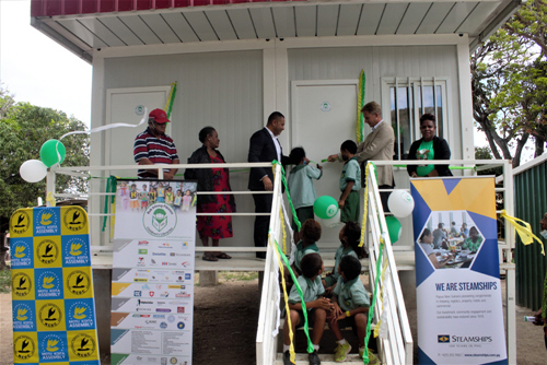 Rupert Bray and Dadi Toka Jr at the opening of the Buk bilong Pikinini Library Learning Centre at Pari village.