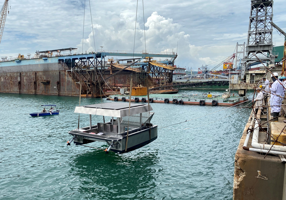 Launching the catamaran, lifted by HUD’s seawall crane.