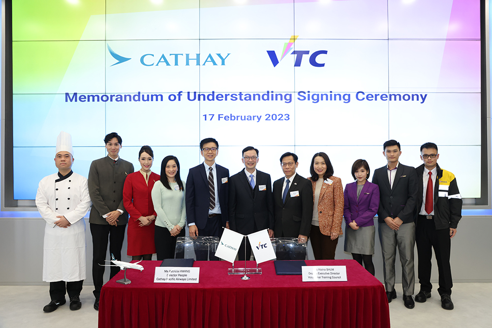 Cathay Pacific Director People, Patricia Hwang, and VTC Deputy Executive Director, Ms Alaina Shum (fourth from left and fourth from right), signed the Cathay Pacific Group&rsquo;s MoU on 17th February, witnessed by Cathay Pacific Group CEO, Ronald Lam, Under Secretary for Transport and Logistics, Mr Liu Chun-san (fifth and sixth from left), and VTC Executive Director, Mr Donald Tong (fifth from right).