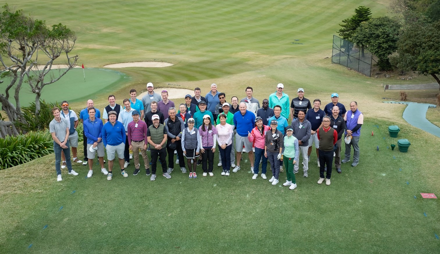  Players gather for the golf tournament. 