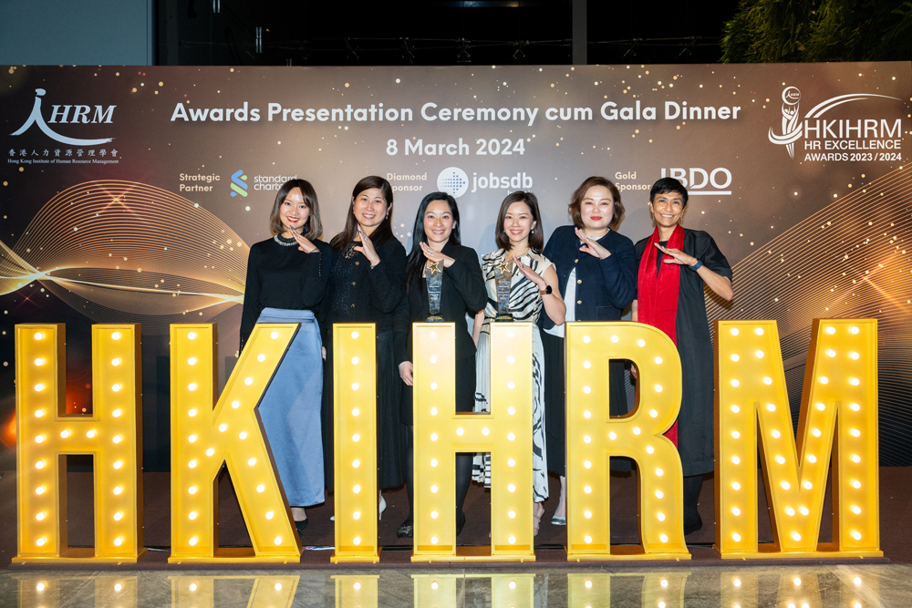 Representatives from Cathay Pacific collect their award at the ceremony.