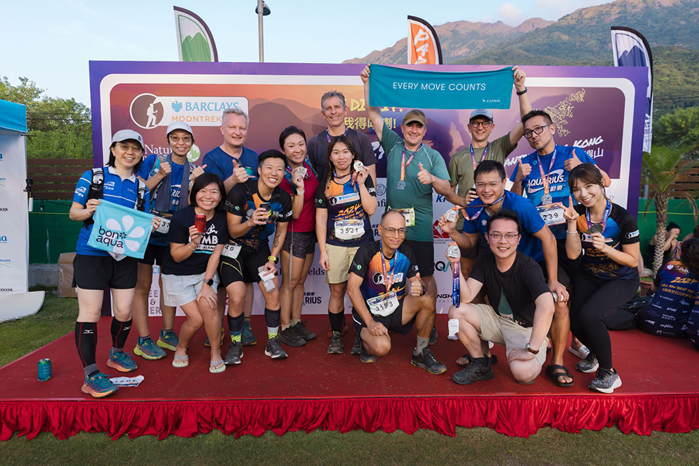 Trail runners from Cathay, John Swire & Sons (H.K.), Swire Coca-Cola and Swire Properties celebrate the completion of this unique event.