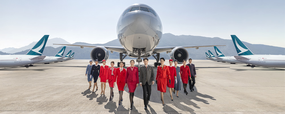 More than 2,000 cabin and ground crew wear vintage Cathay Pacific uniforms as part of the 80th anniversary celebrations.